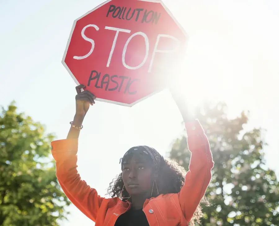 A campaigner holding a sign